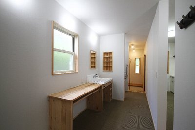 洗面室→トイレは、ドアを設けずオープンな空間に仕上げました 洗面室→トイレは、ドアを設けずオープンな空間に仕上げました